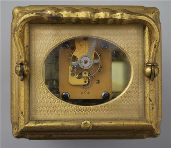 An early 20th century brass gorge cased carriage clock, 5.25 excl. handle.
